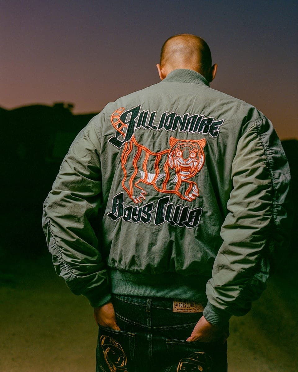 The back of a Billionaire Boys Club bomber jacket at dusk