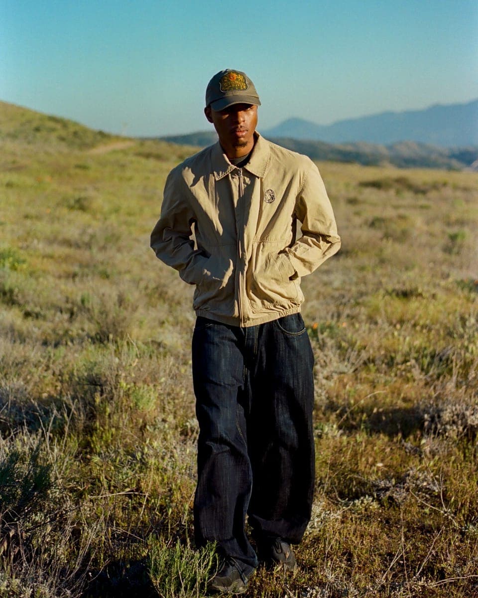 A Billionaire Boys Club jacket and cap in the hills