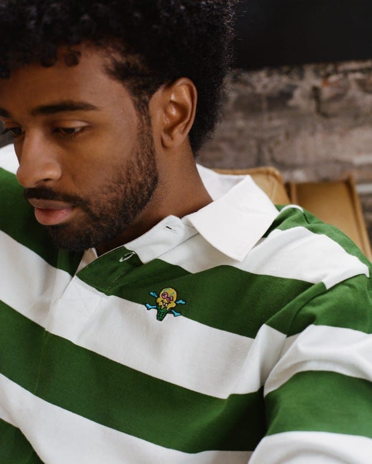 A green and white Billionaire Boys Club rugby shirt