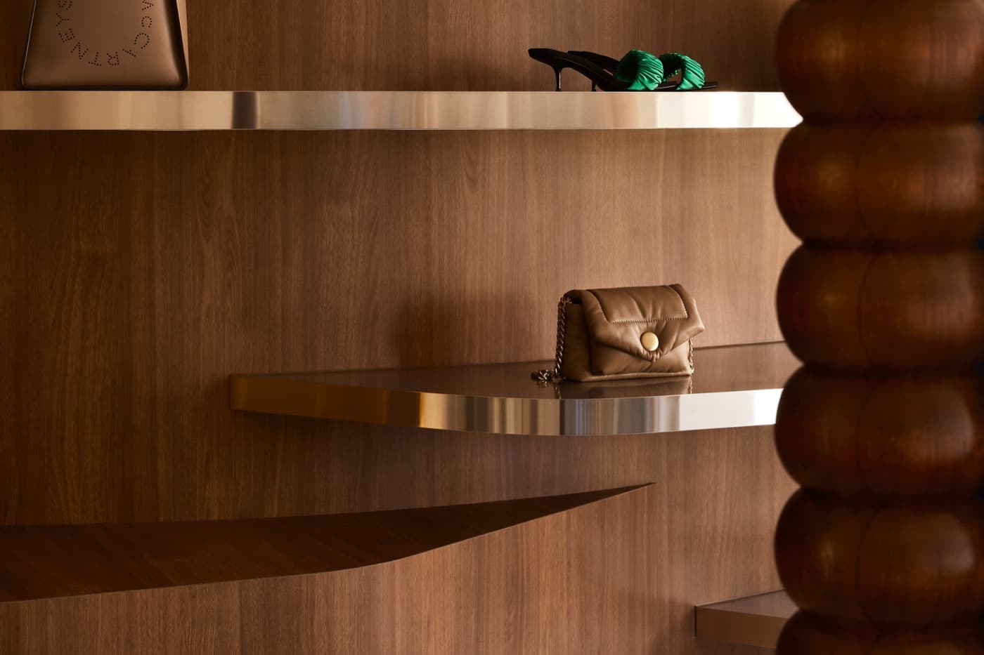 Shoes, bags and jewellery styled on shelving at Grace Brighton
