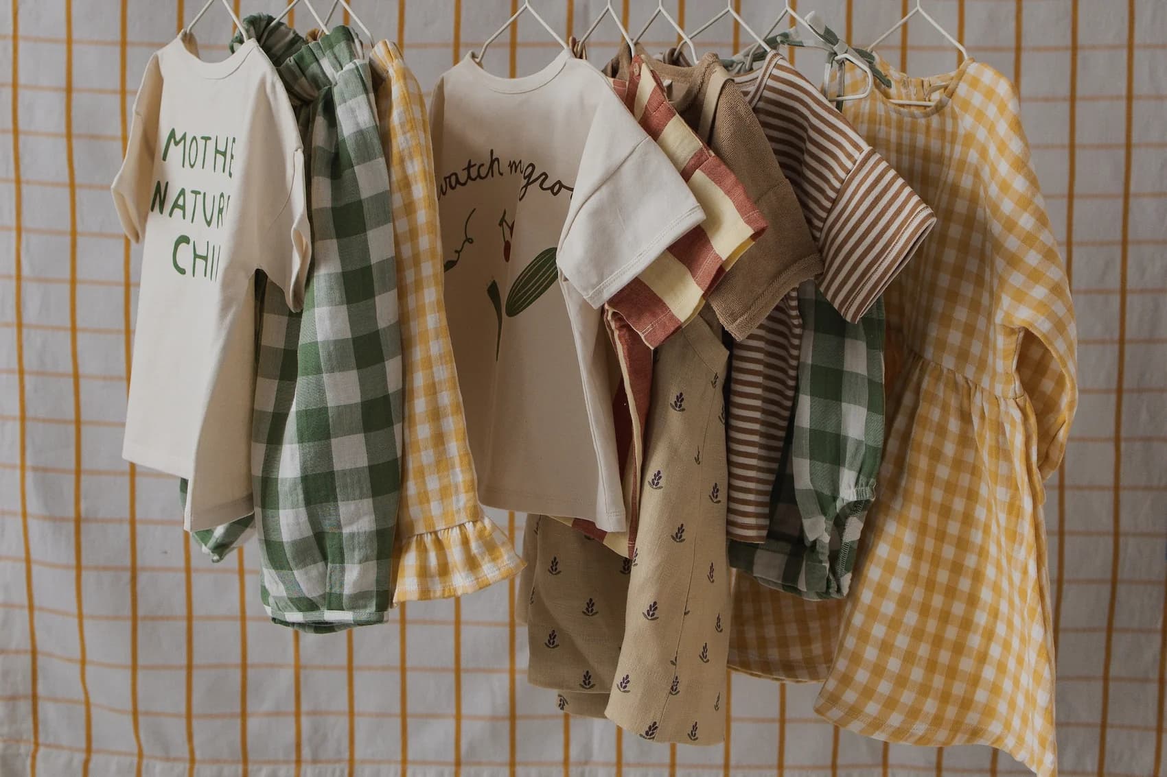 A rail of Organic Zoo organic cotton childrenswear in mixed prints
