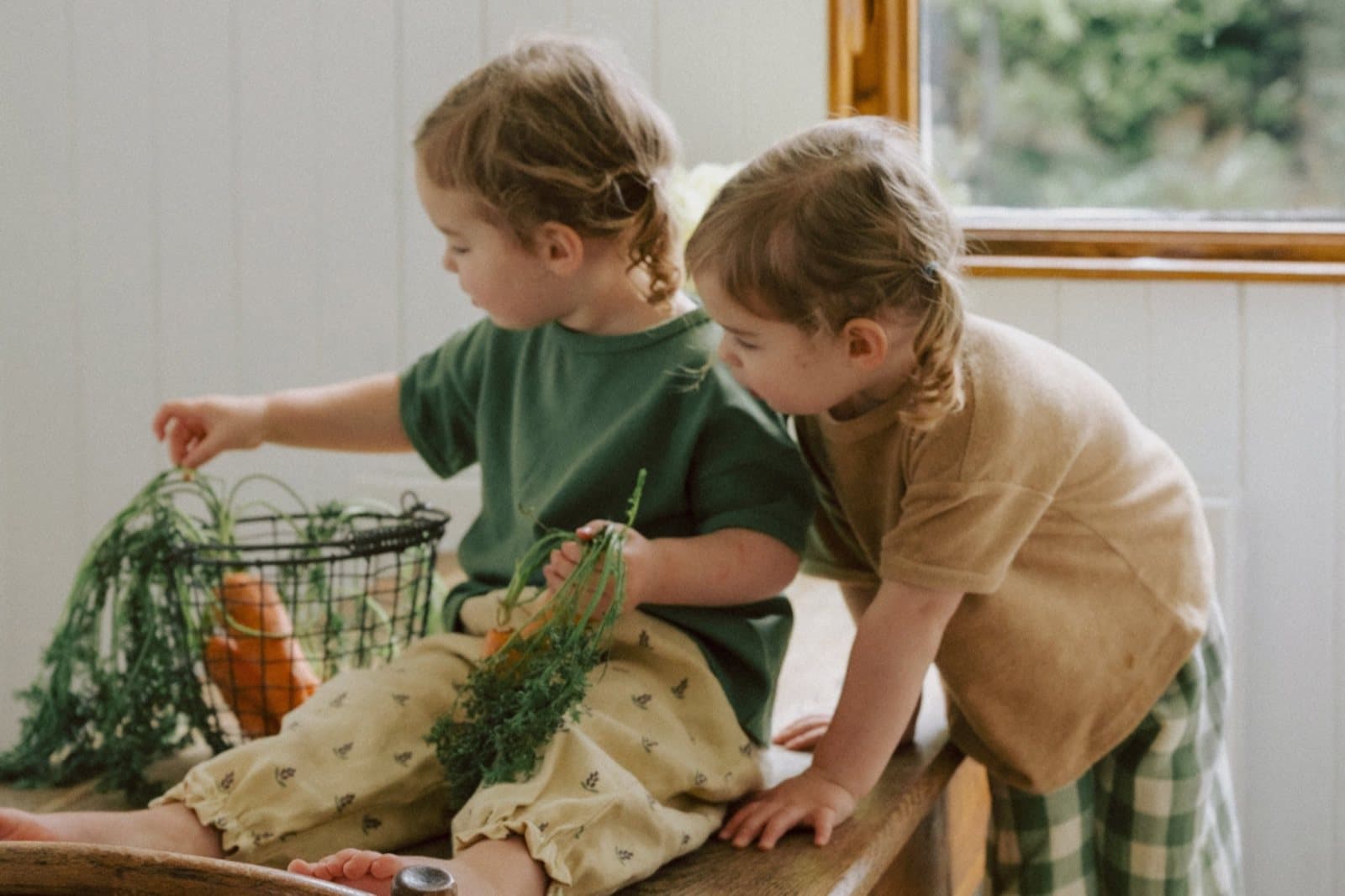 Two children in Organic Zoo cotton separates