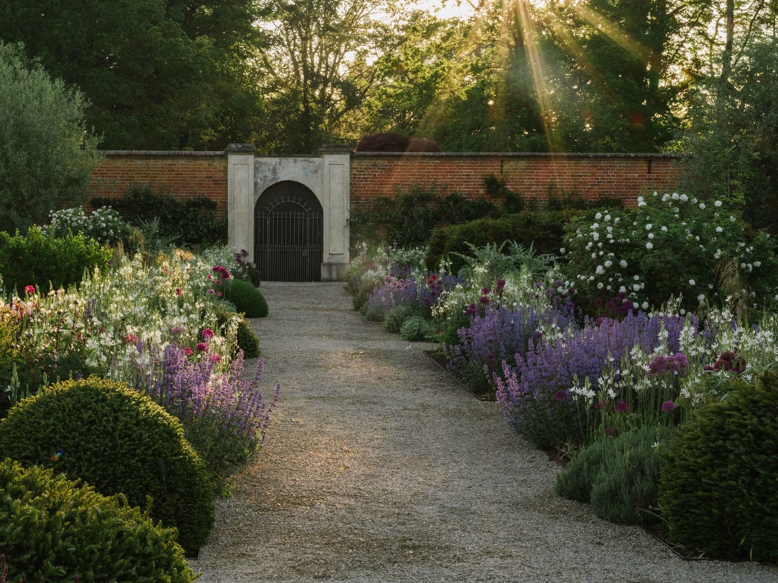 The walled garden at the Heckfield Estate in Hampshire, home of Wildsmith Skin, in evening light
