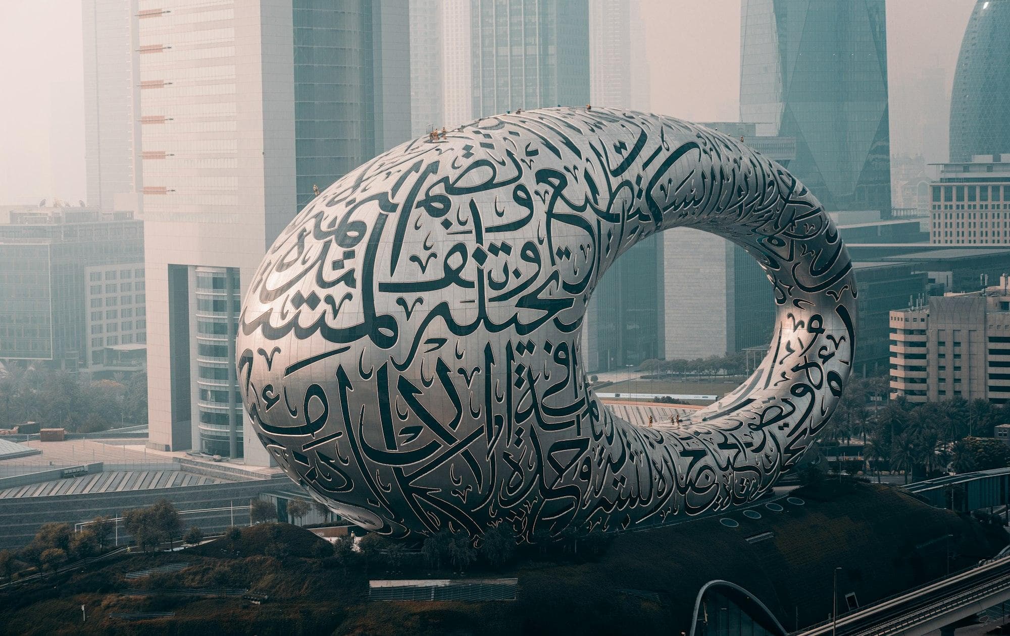 The Museum of the Future in Dubai, its facade cut with Arabic calligraphy